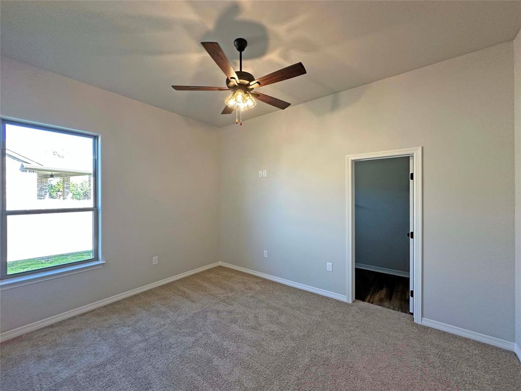 133 Lasso Loop Lorena, TX 76655 - Photo 20 of 22 a view of an empty room with a window