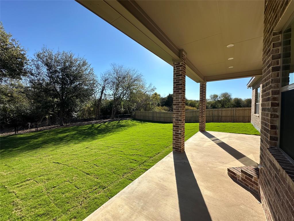 133 Lasso Loop Lorena, TX 76655 - Photo 3 of 22 a view of swimming pool with a yard