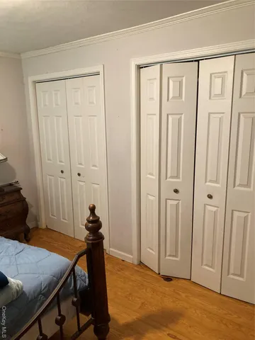 a view of a livingroom with furniture and wooden floor