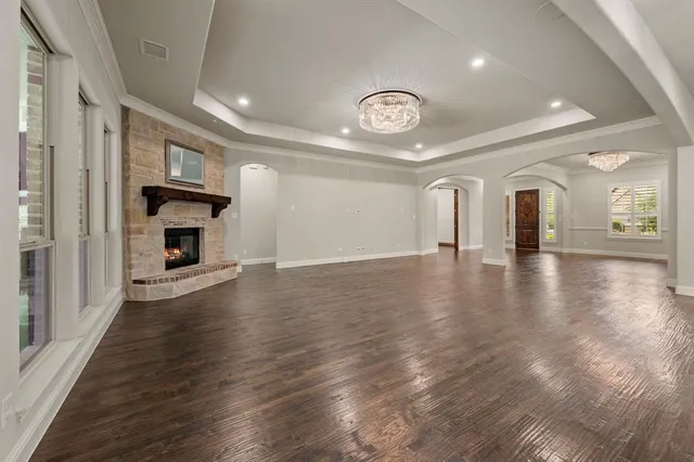 a kitchen with kitchen island a counter top space appliances and cabinets