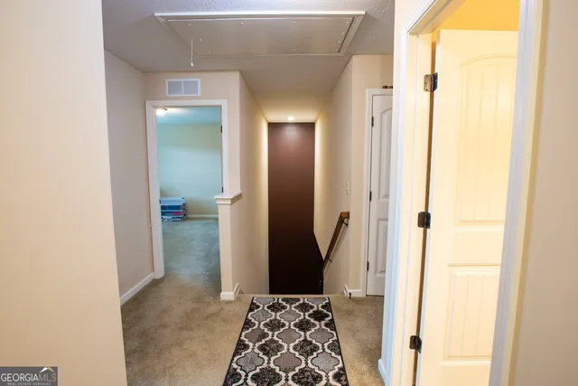 a room with furniture and a window