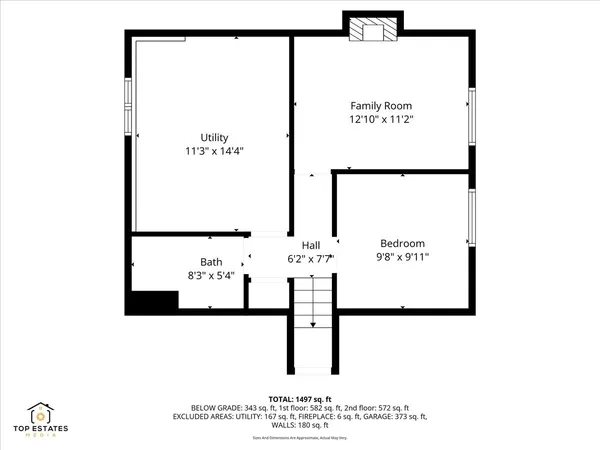 a picture of a bench in front of a wall