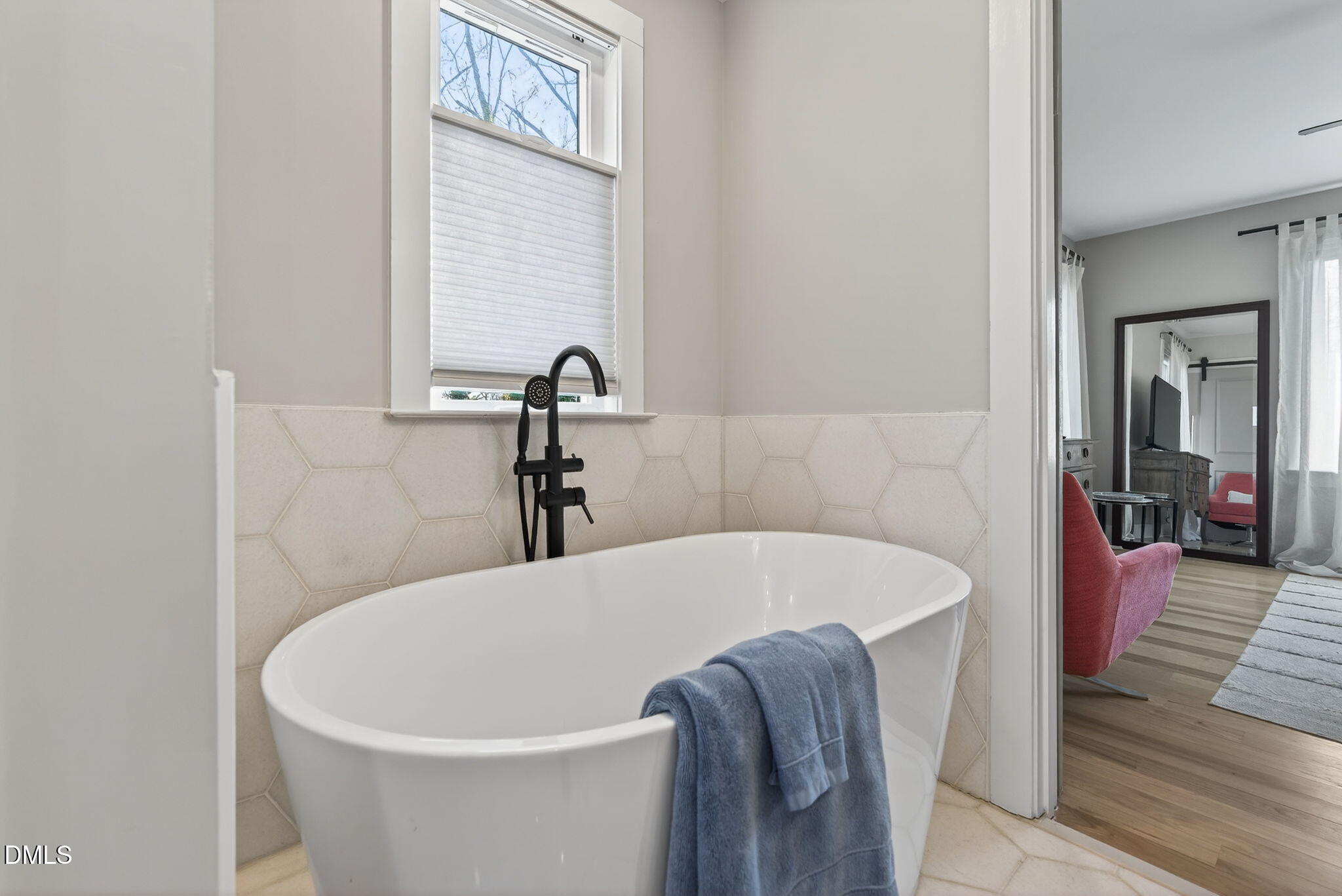 213 Lincoln Court Raleigh, NC 27610 - Photo 30 of 40 a white bath tub sitting in a bathroom