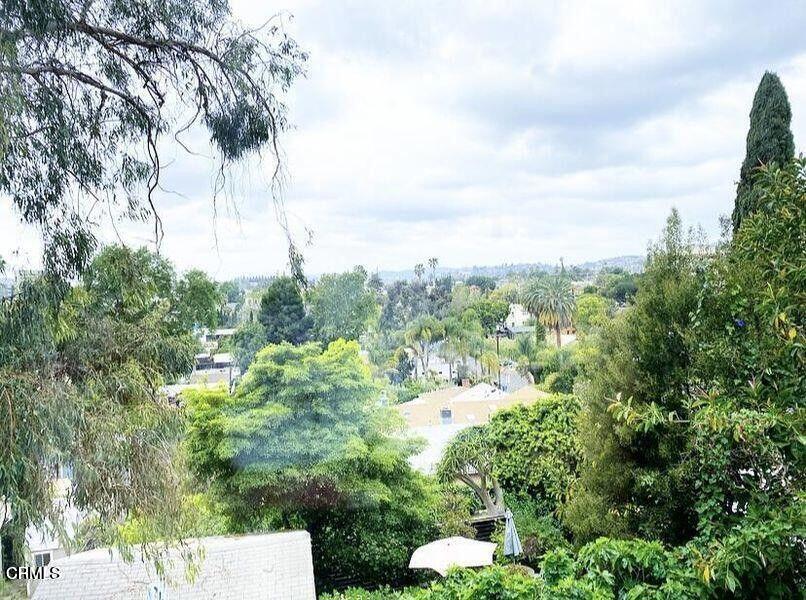 4018 Camero Avenue, Unit 2 Los Angeles, CA 90027 - Photo 13 of 14 a view of a city with lush green forest