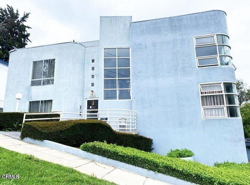 4018 Camero Avenue, Unit 2 Los Angeles, CA 90027 - Photo 14 of 14 a view of a building with a yard