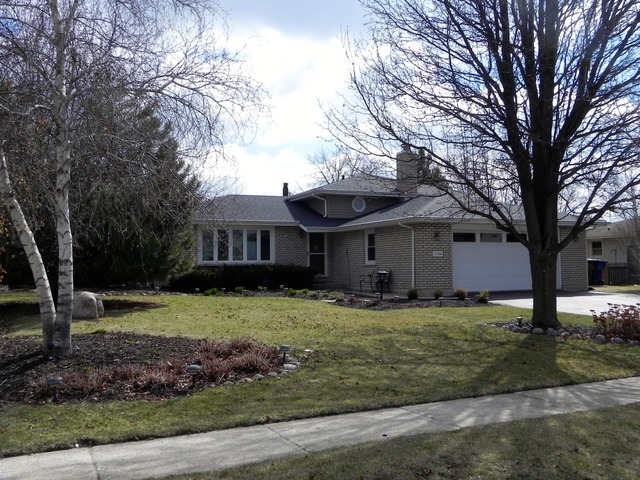 1034 Southgate Road New Lenox, IL 60451 - Photo 1 of 21 a view of a yard in front of a house with large tree