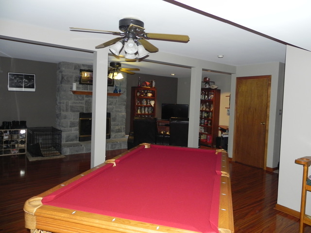 1034 Southgate Road New Lenox, IL 60451 - Photo 11 of 21 a bed room with a bed and a television