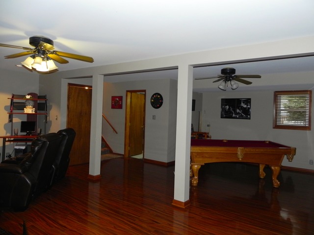 1034 Southgate Road New Lenox, IL 60451 - Photo 12 of 21 a view of a livingroom with furniture and wooden floor