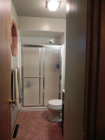 1034 Southgate Road New Lenox, IL 60451 - Photo 17 of 21 a bathroom with a granite countertop toilet and a sink