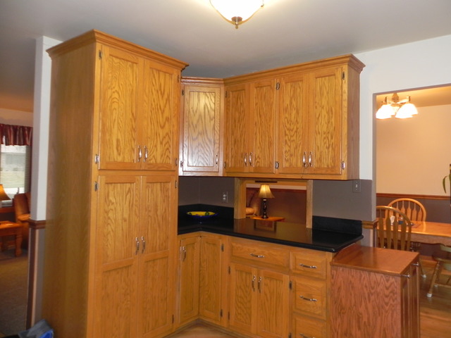 1034 Southgate Road New Lenox, IL 60451 - Photo 6 of 21 a kitchen with a window and cabinets