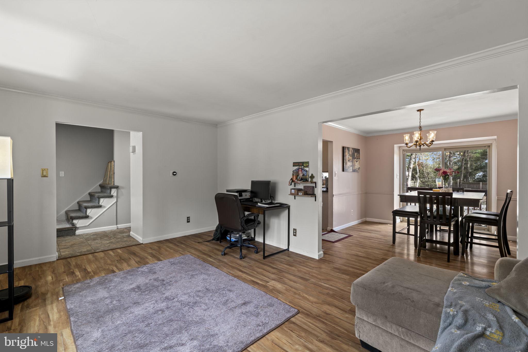 4 Margy Lane Marlton, NJ 08053 - Photo 12 of 46 a view of a livingroom with furniture and a workspace