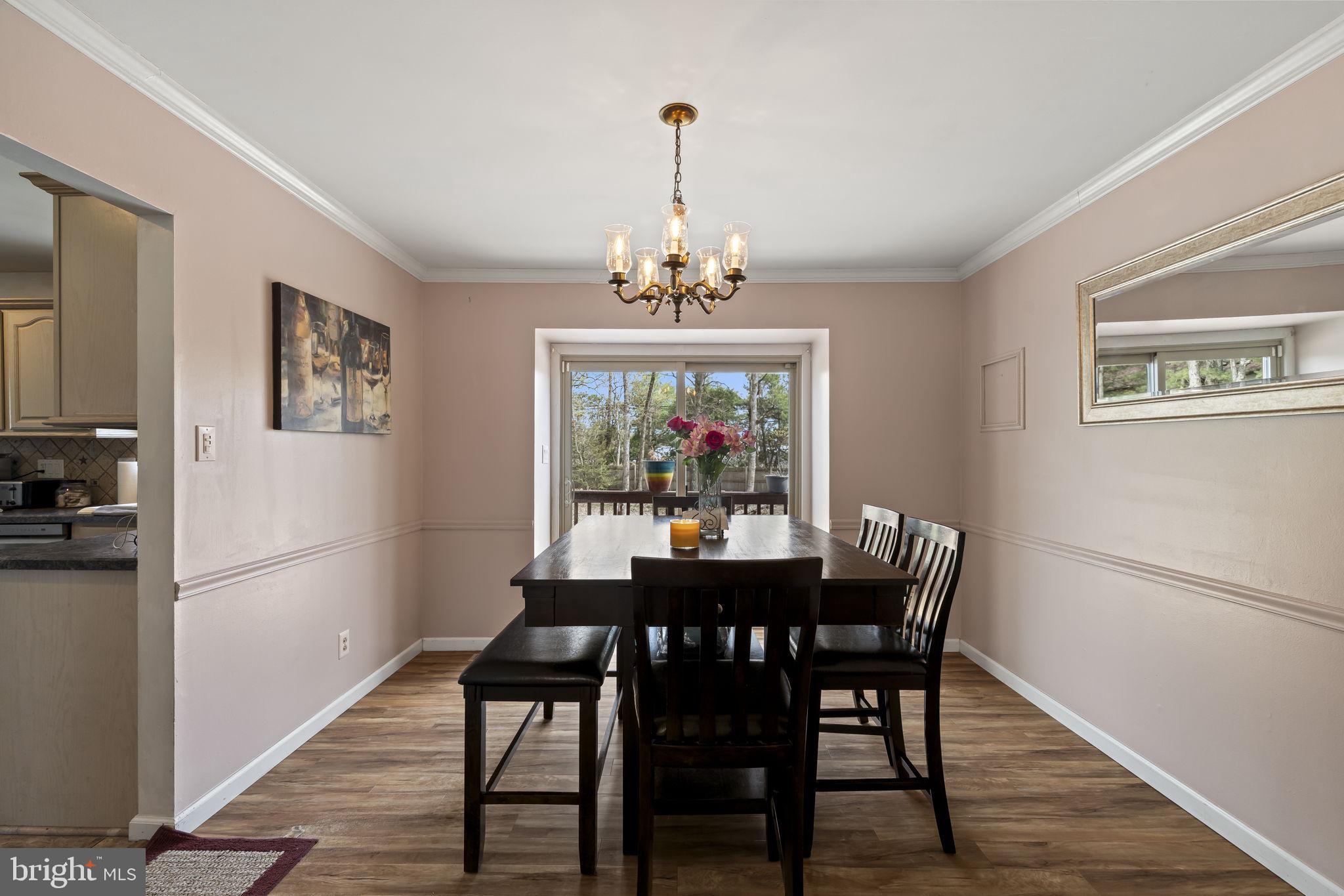 4 Margy Lane Marlton, NJ 08053 - Photo 13 of 46 a view of a dining room with furniture window and wooden floor