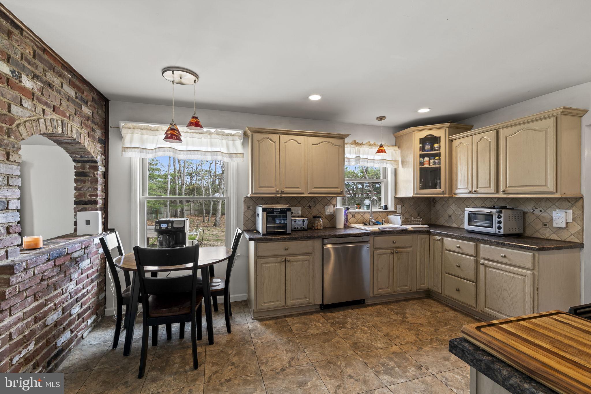 4 Margy Lane Marlton, NJ 08053 - Photo 15 of 46 a kitchen with granite countertop appliances cabinets and furniture