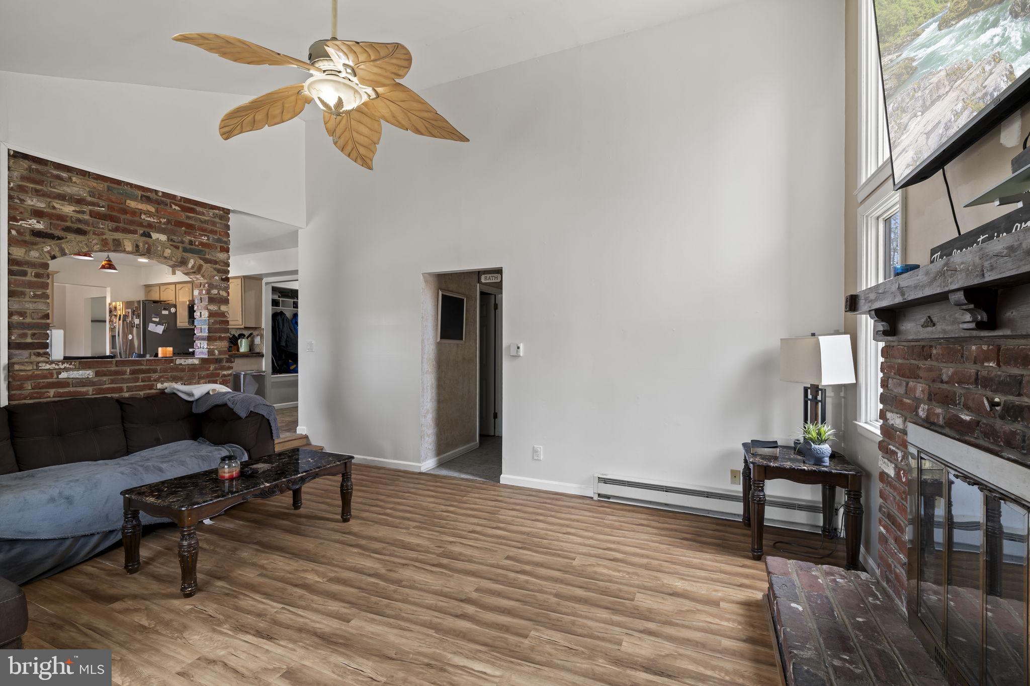 4 Margy Lane Marlton, NJ 08053 - Photo 18 of 46 a view of a livingroom with furniture and a ceiling fan