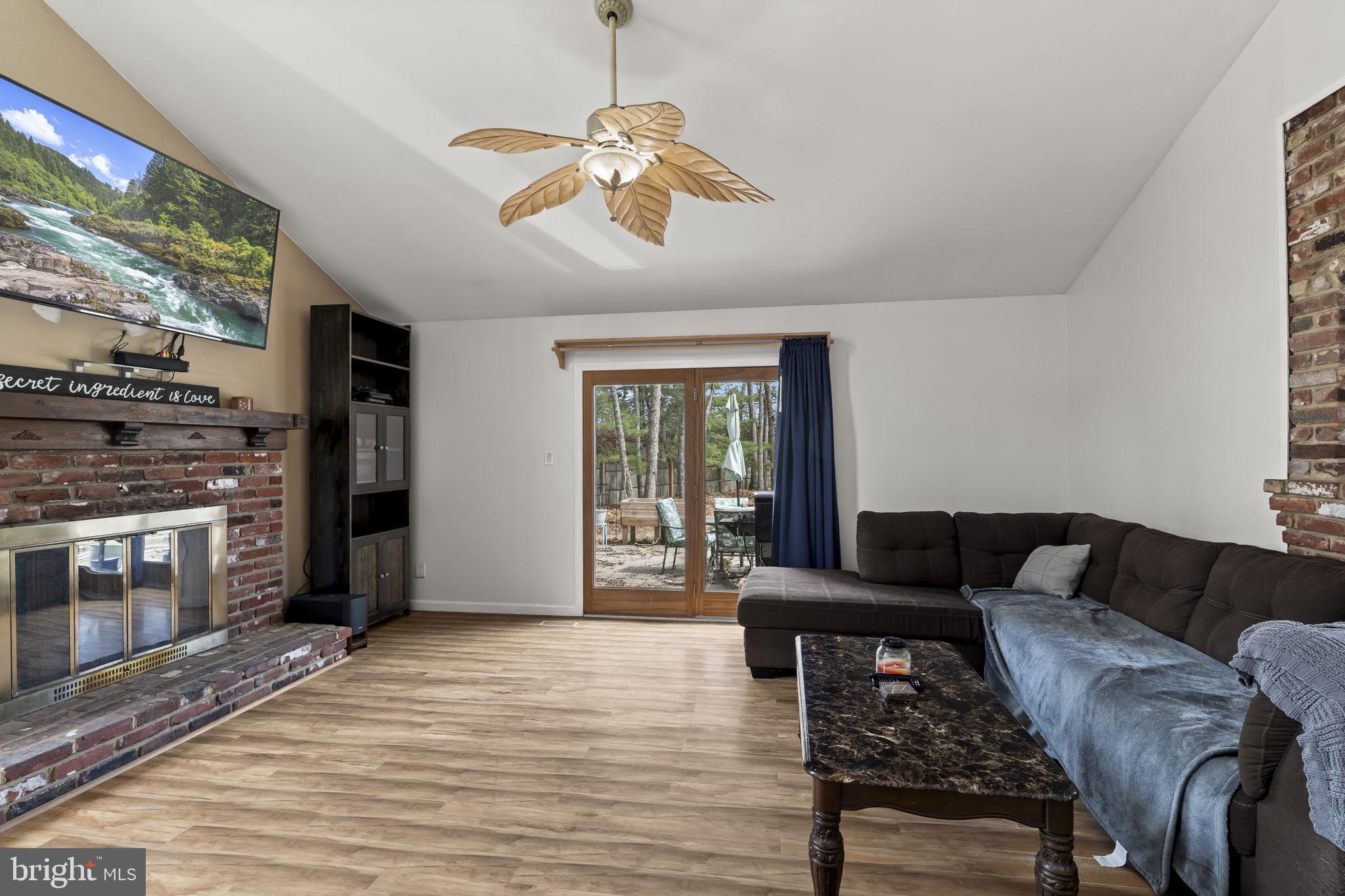 4 Margy Lane Marlton, NJ 08053 - Photo 20 of 46 a living room with furniture and a fireplace
