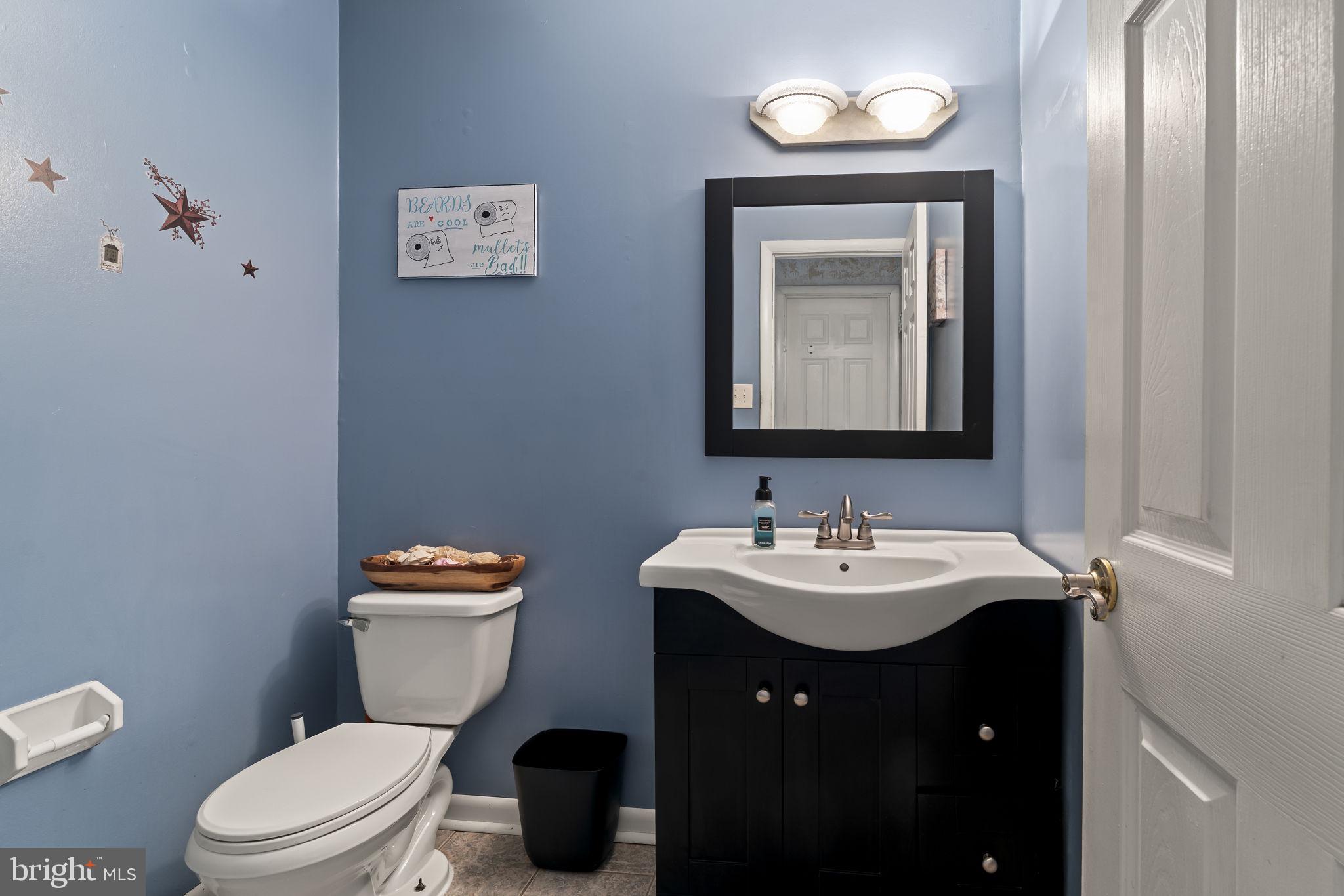 4 Margy Lane Marlton, NJ 08053 - Photo 22 of 46 a bathroom with a toilet sink and mirror