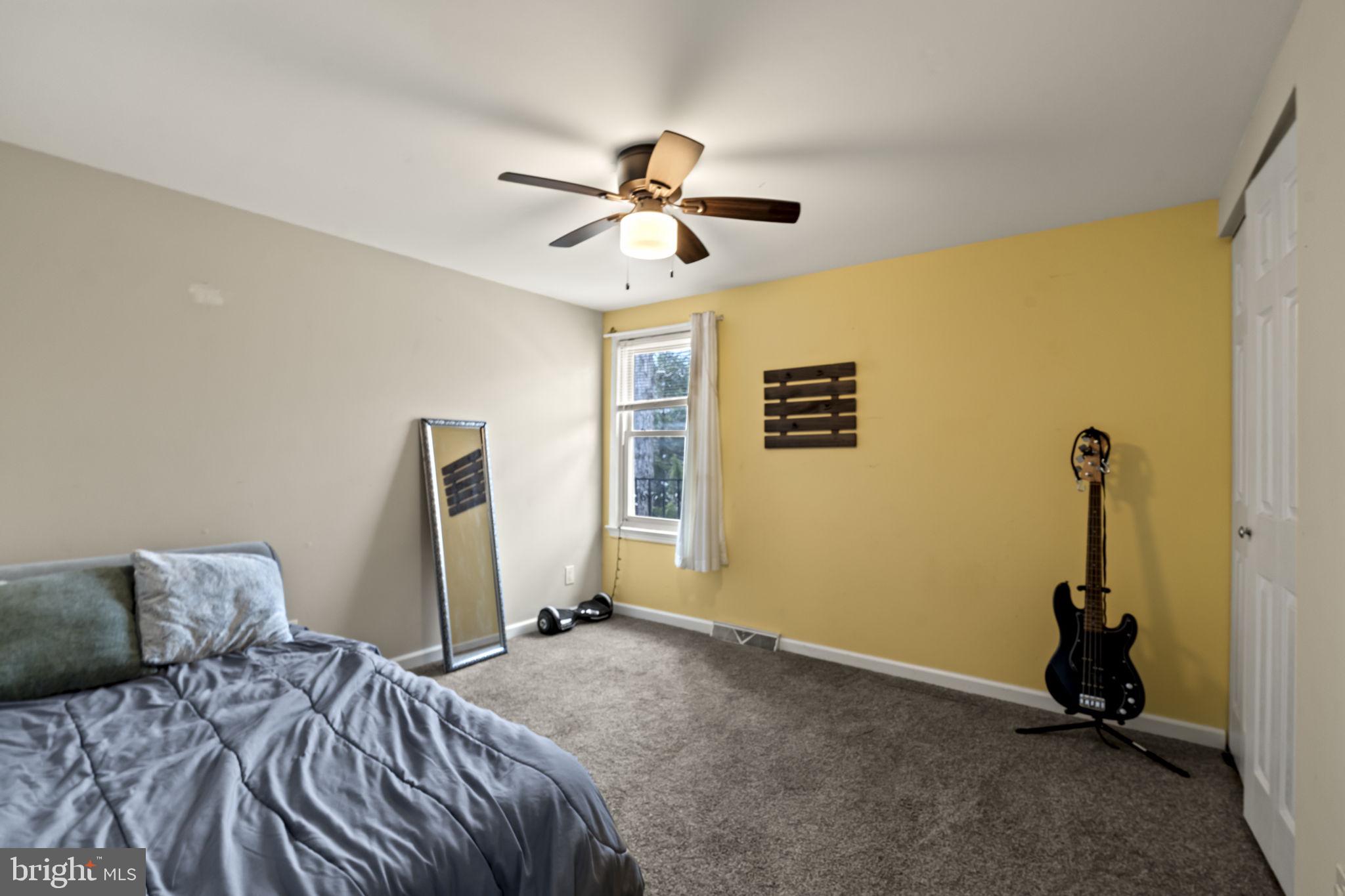 4 Margy Lane Marlton, NJ 08053 - Photo 30 of 46 a bedroom with a bed and a flat screen tv