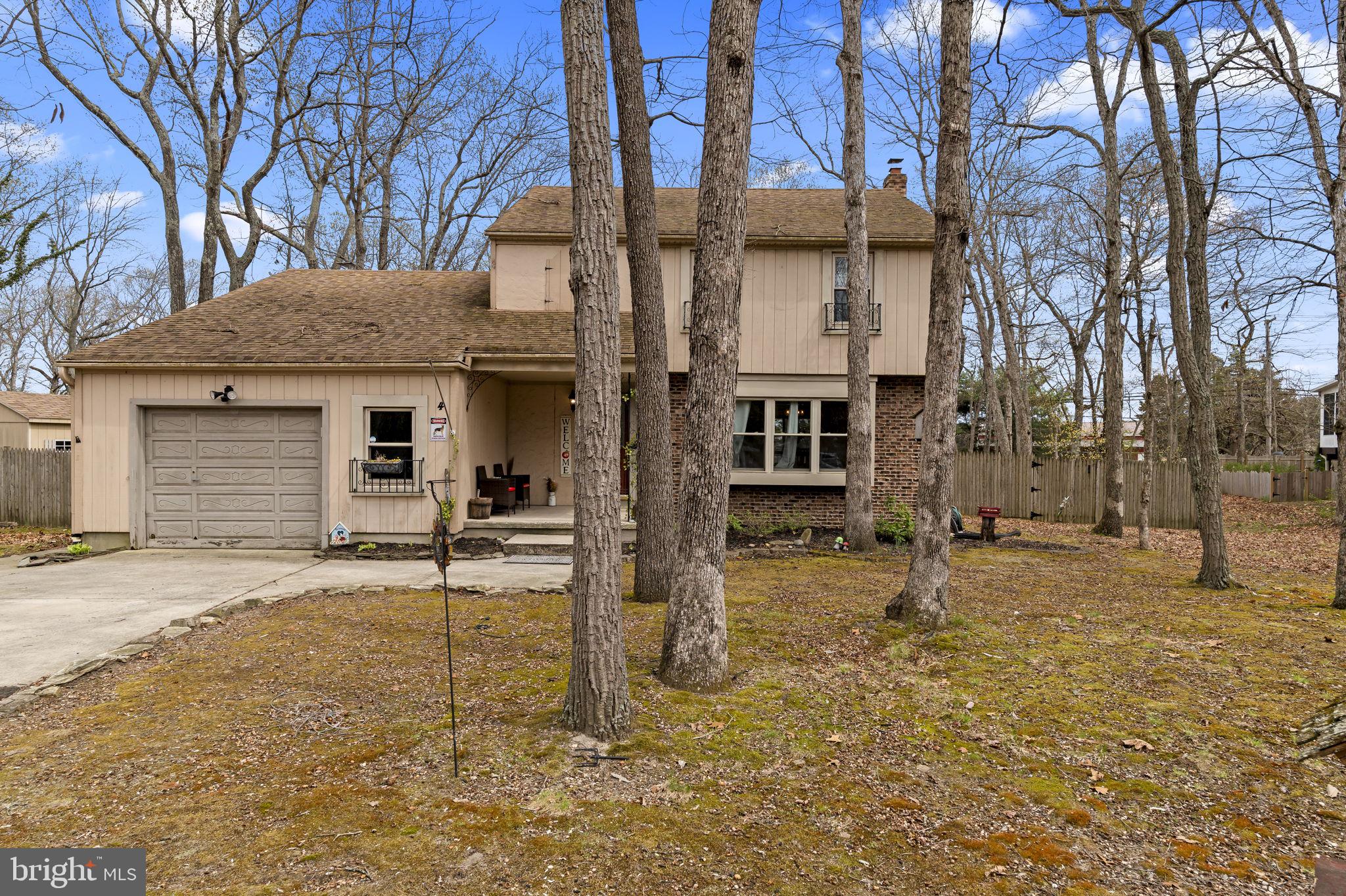 4 Margy Lane Marlton, NJ 08053 - Photo 3 of 46 a house with trees in the background