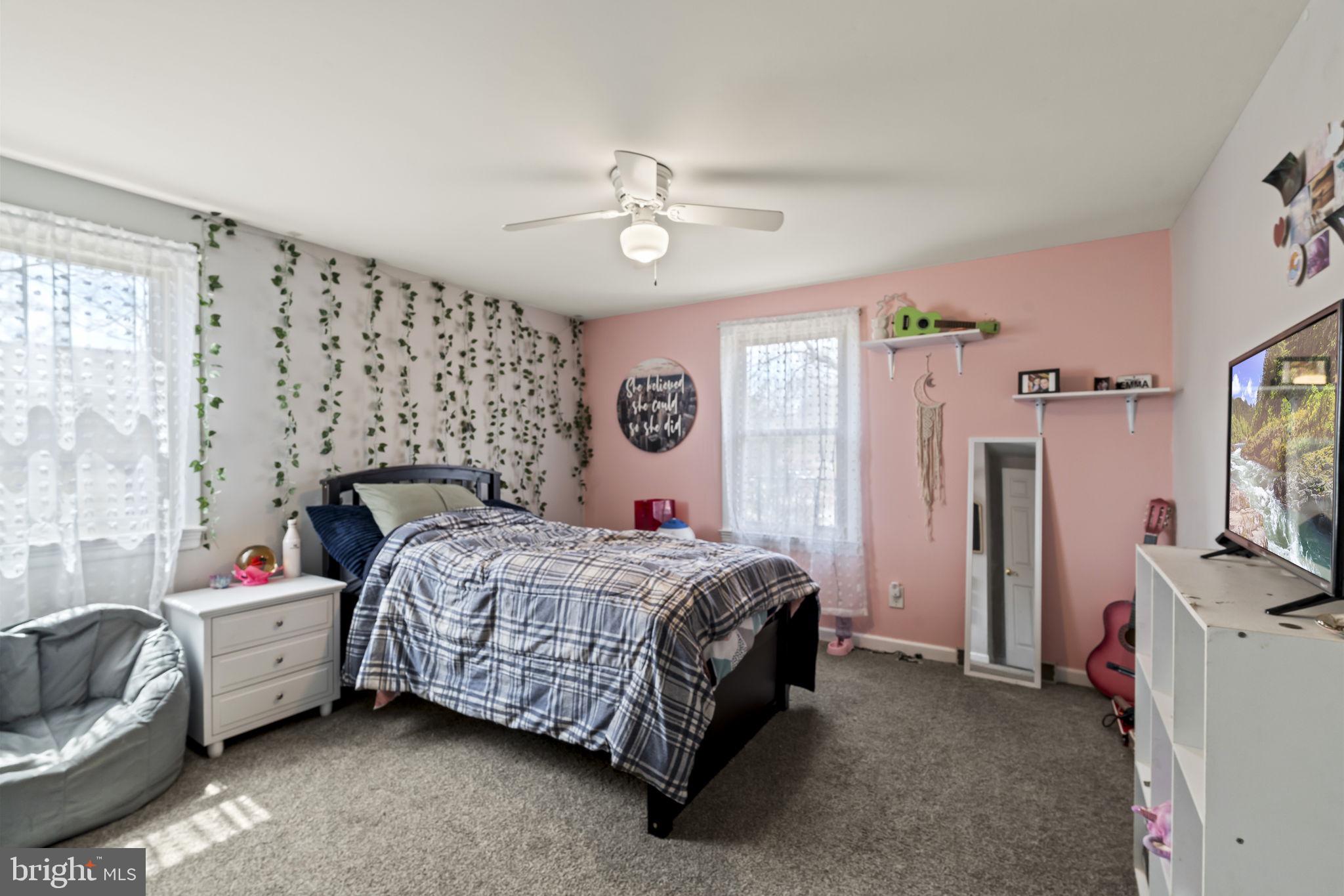4 Margy Lane Marlton, NJ 08053 - Photo 32 of 46 a bedroom with a bed and a couch