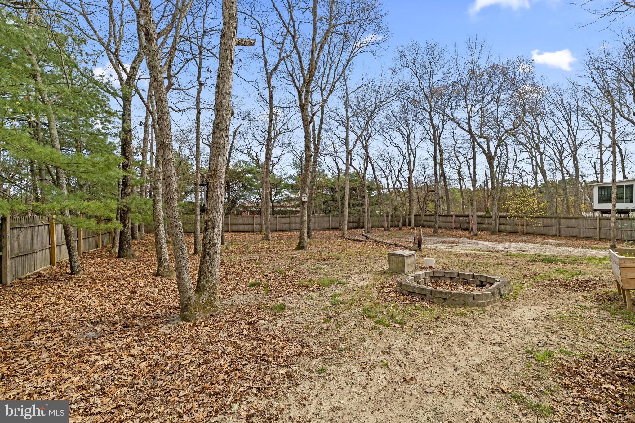 4 Margy Lane Marlton, NJ 08053 - Photo 43 of 46 a backyard of a house with lots of green space