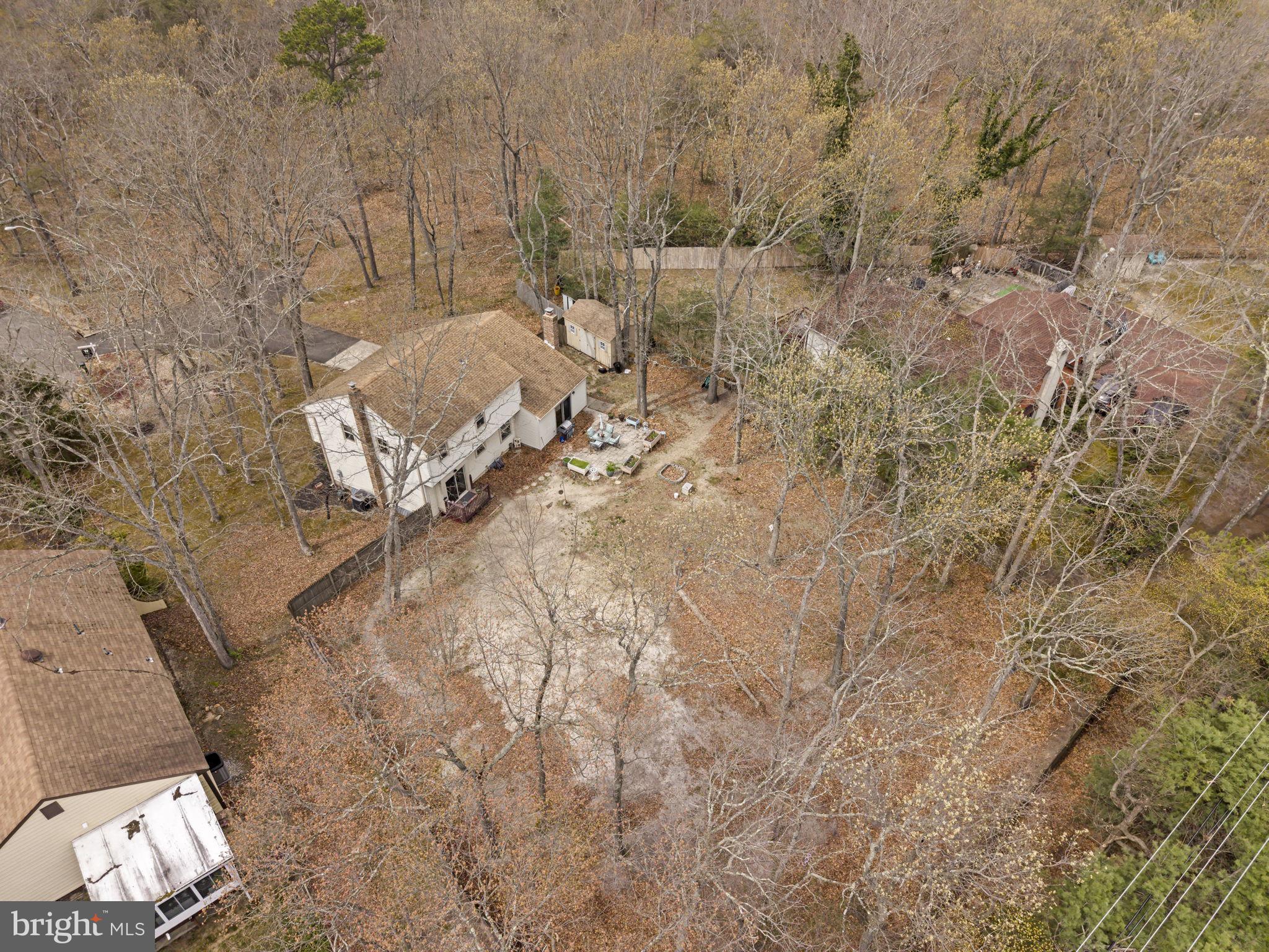 4 Margy Lane Marlton, NJ 08053 - Photo 8 of 46 a view of a dry yard with trees