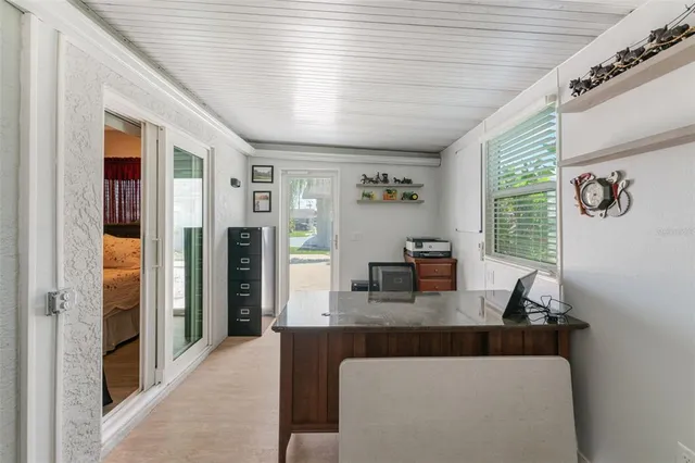 a kitchen with counter top space sink stove and refrigerator