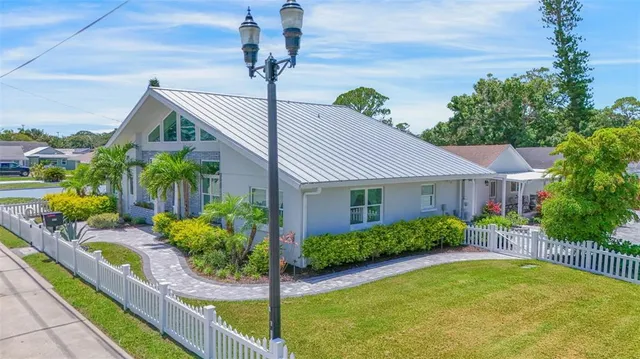 a bathroom with a toilet sink and shower