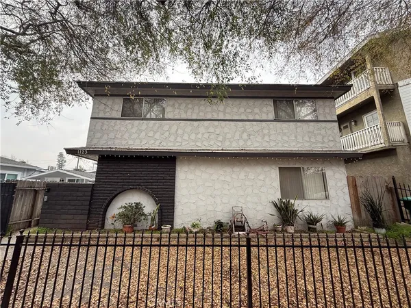 a front view of a house with a balcony