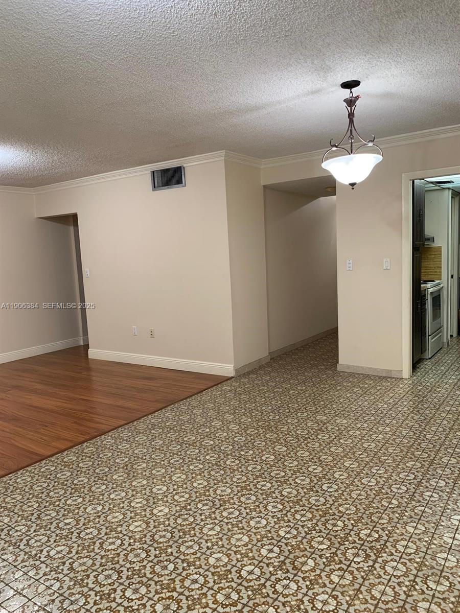 2690 Southwest 22nd Avenue, Unit 505 Miami, FL 33133 - Photo 16 of 21 a view of empty room with wooden floor