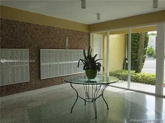 a view of outdoor space with garden and seating area