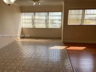 2690 Southwest 22nd Avenue, Unit 505 Miami, FL 33133 - Photo 3 of 21 a view of an empty room and window