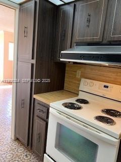 2690 Southwest 22nd Avenue, Unit 505 Miami, FL 33133 - Photo 8 of 21 a stove top oven sitting inside of a kitchen