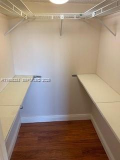 2690 Southwest 22nd Avenue, Unit 505 Miami, FL 33133 - Photo 10 of 21 a view of a room with racks on the wall