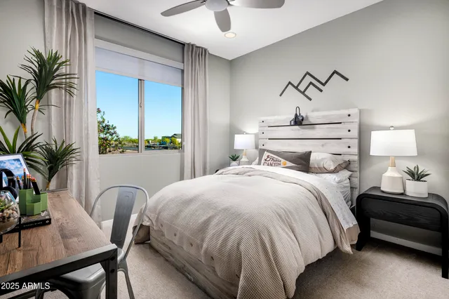 a bed room with a bed and a night stand