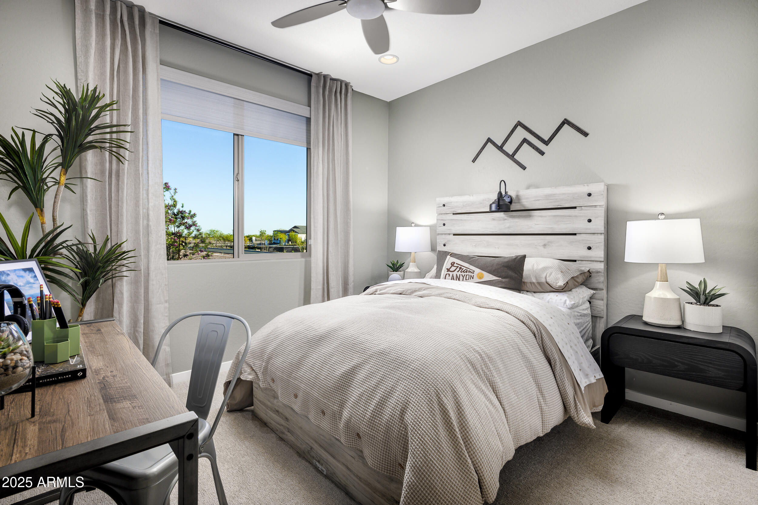 9784 Gold Stone Trail Apache Junction, AZ 85120 - Photo 14 of 46 a bedroom with a bed and a potted plant