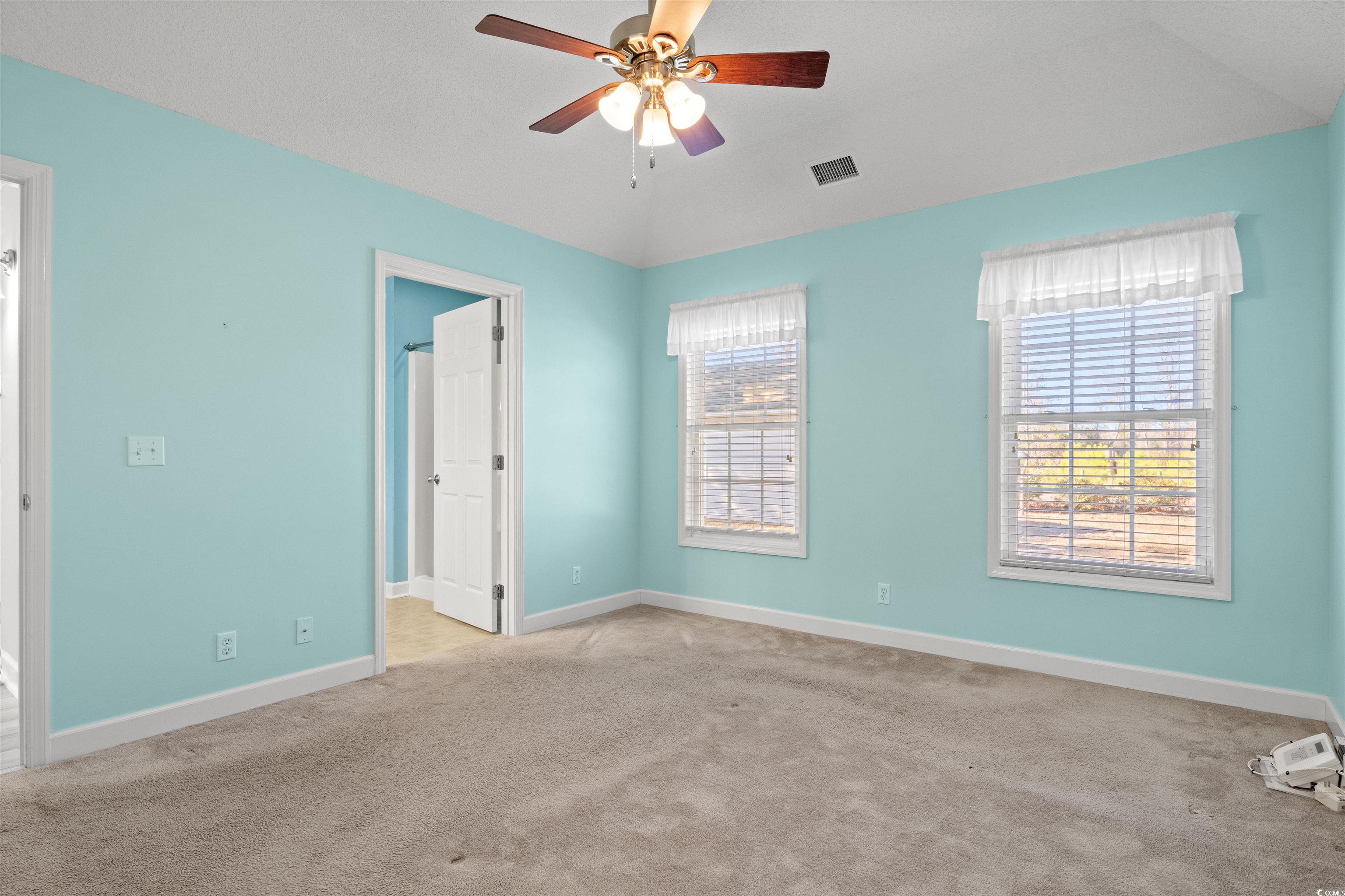 125 Dayglow Drive Loris, SC 29569 - Photo 15 of 24 Carpeted spare room featuring ceiling fan, lofted