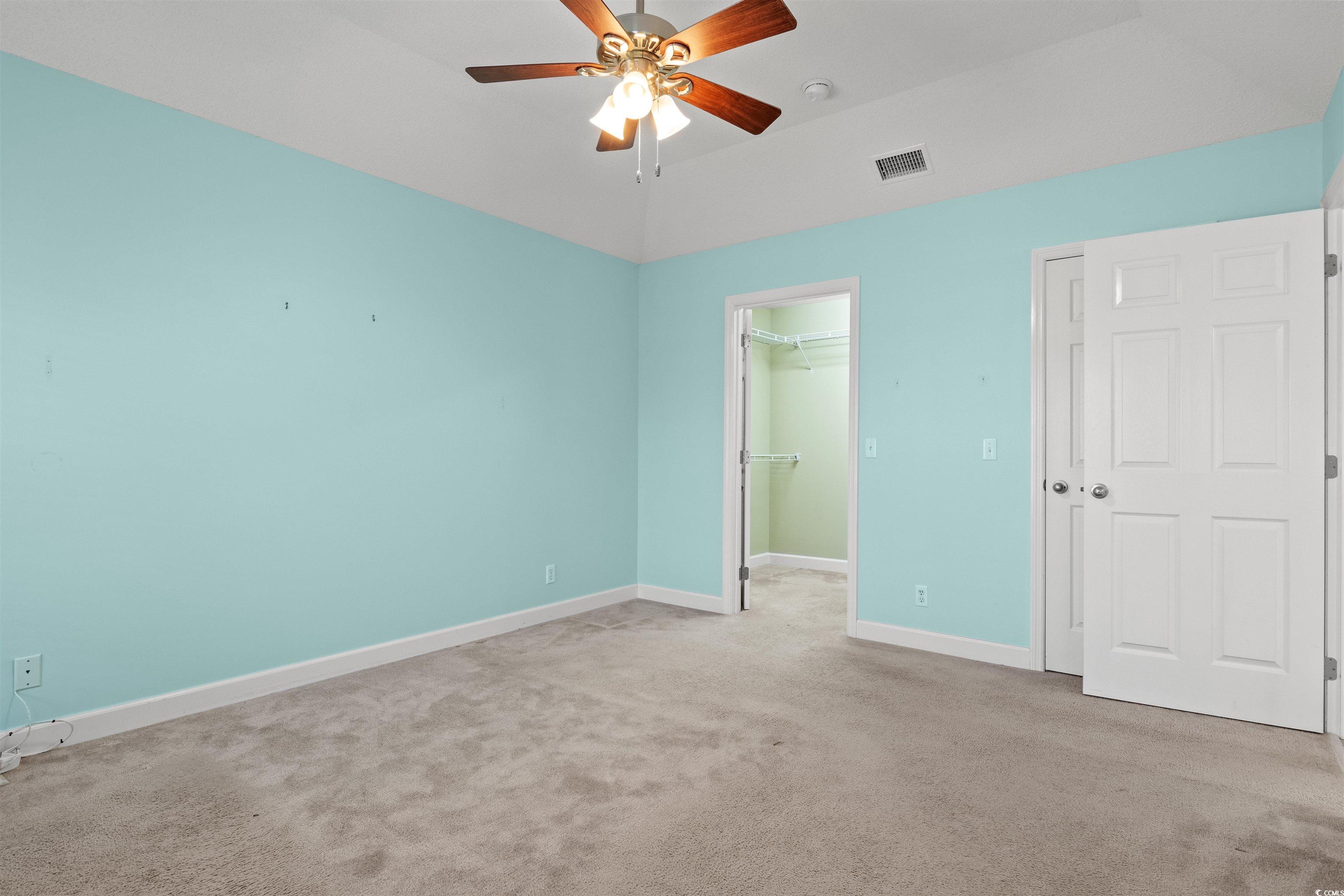 125 Dayglow Drive Loris, SC 29569 - Photo 17 of 24 Unfurnished bedroom with carpet, a closet, visible