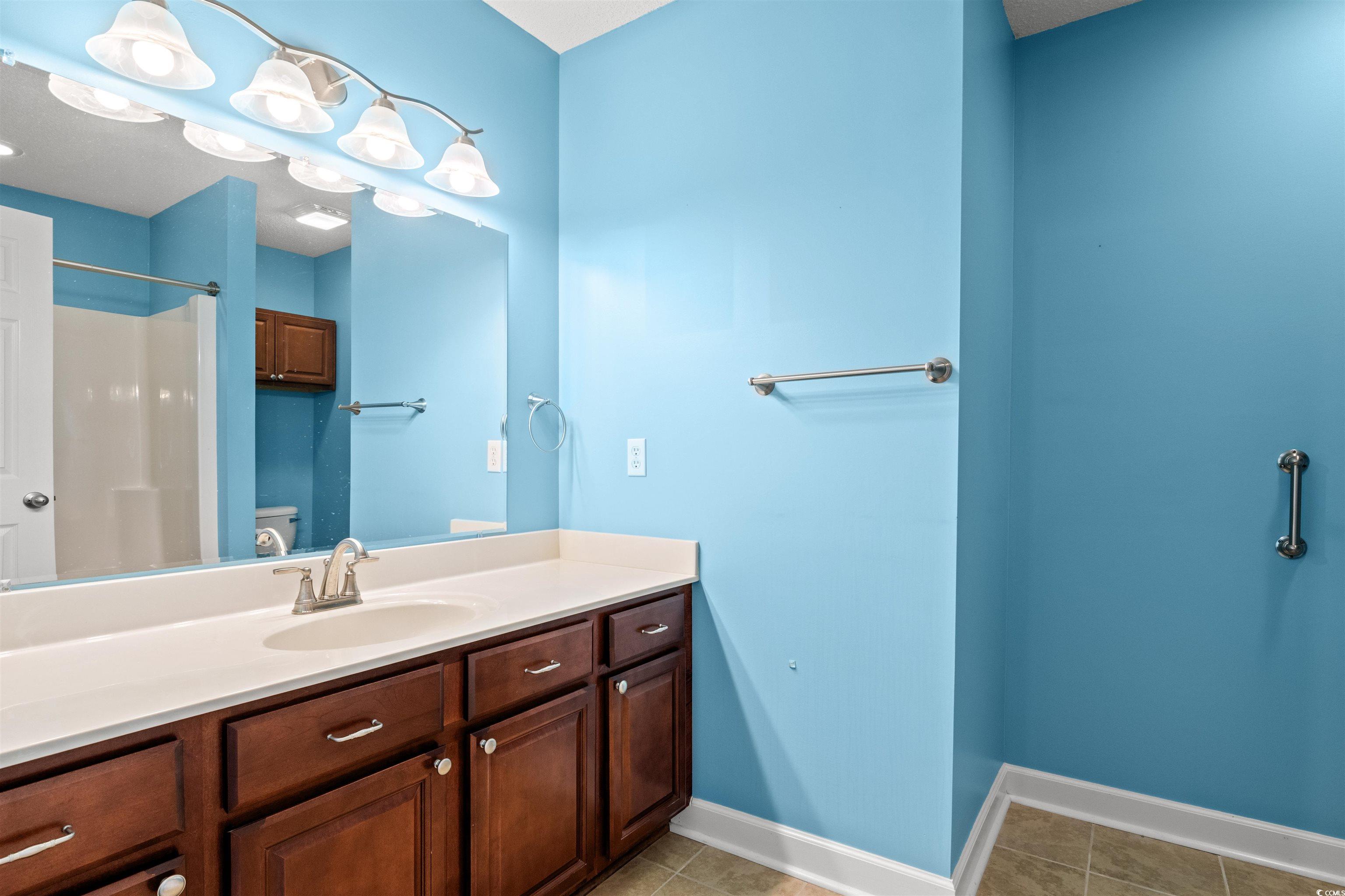 125 Dayglow Drive Loris, SC 29569 - Photo 18 of 24 Full bathroom with tile patterned flooring, toilet