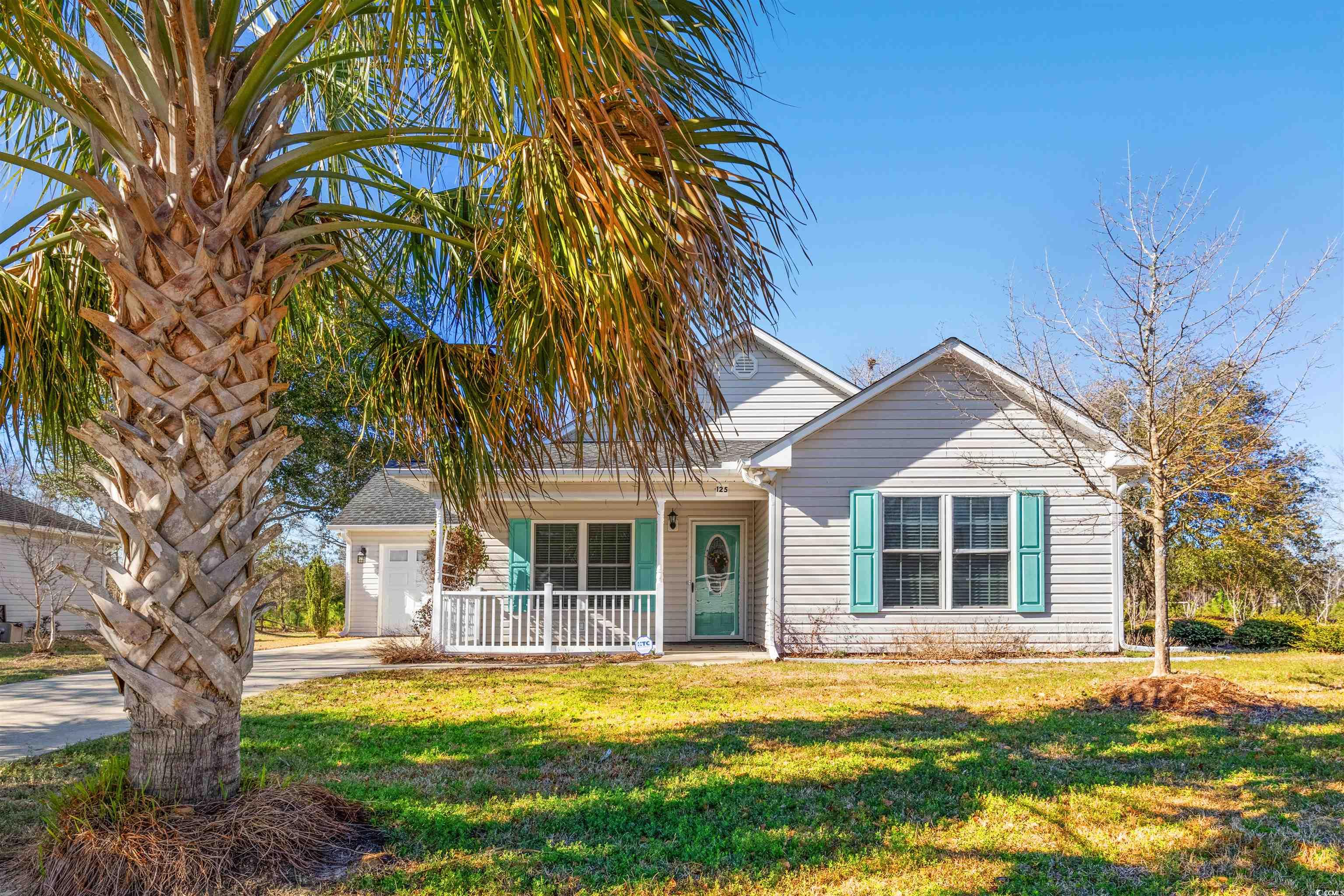 125 Dayglow Drive Loris, SC 29569 - Photo 21 of 24 View of front facade featuring a garage, concrete