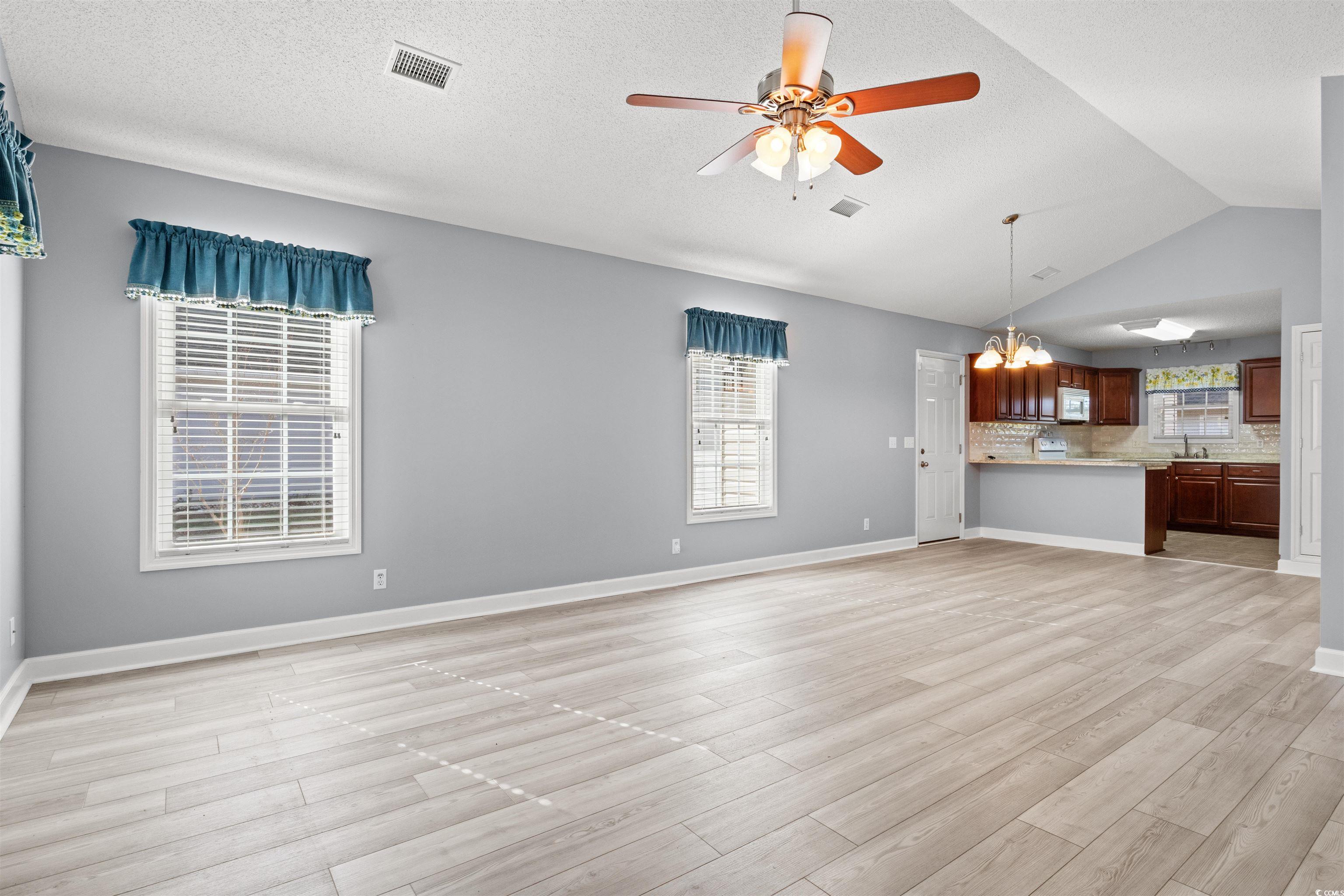 125 Dayglow Drive Loris, SC 29569 - Photo 4 of 24 Unfurnished living room with visible vents, plenty