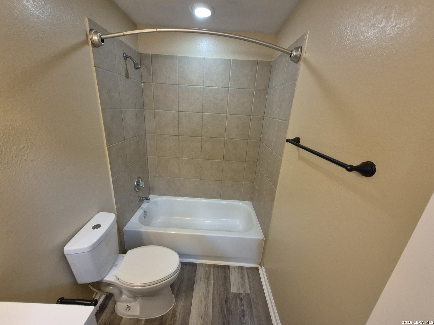 8806 Slumber Lane Converse, TX 78109 - Photo 15 of 39 a bathroom with a toilet and a shower