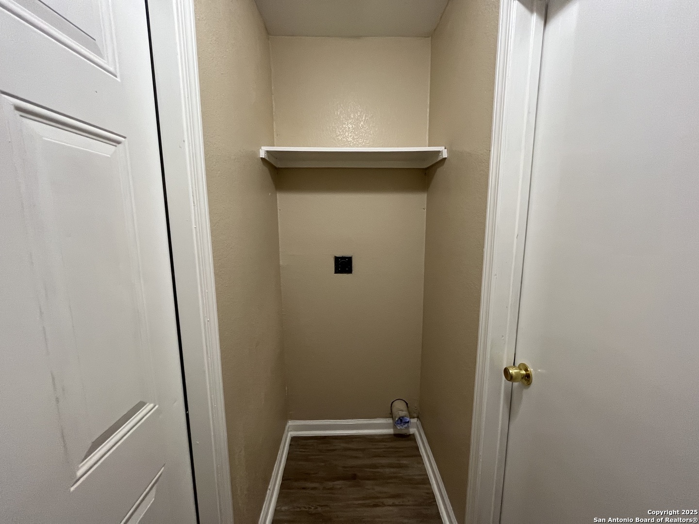 8806 Slumber Lane, Unit 101 Converse, TX 78109 - Photo 18 of 38 a view of a hallway with wooden door