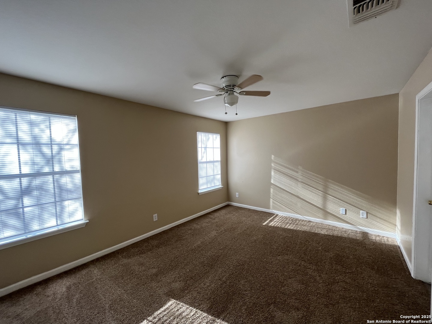 8806 Slumber Lane, Unit 101 Converse, TX 78109 - Photo 19 of 38 a view of an empty room with a window