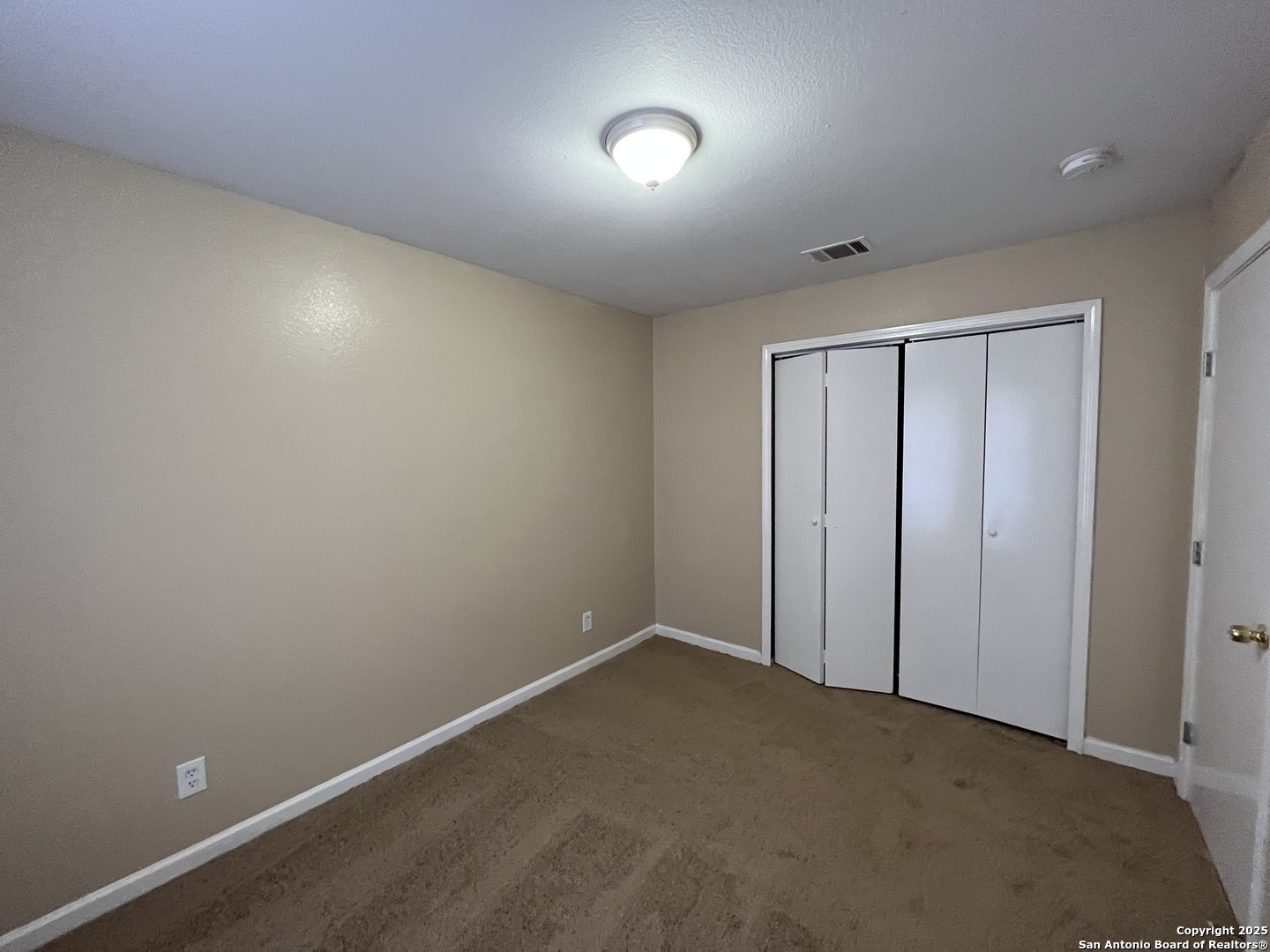 8806 Slumber Lane, Unit 101 Converse, TX 78109 - Photo 26 of 38 a view of an empty room