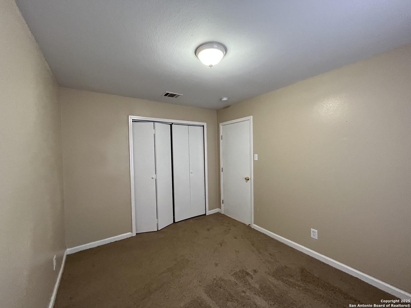 8806 Slumber Lane, Unit 101 Converse, TX 78109 - Photo 27 of 38 a view of an empty room