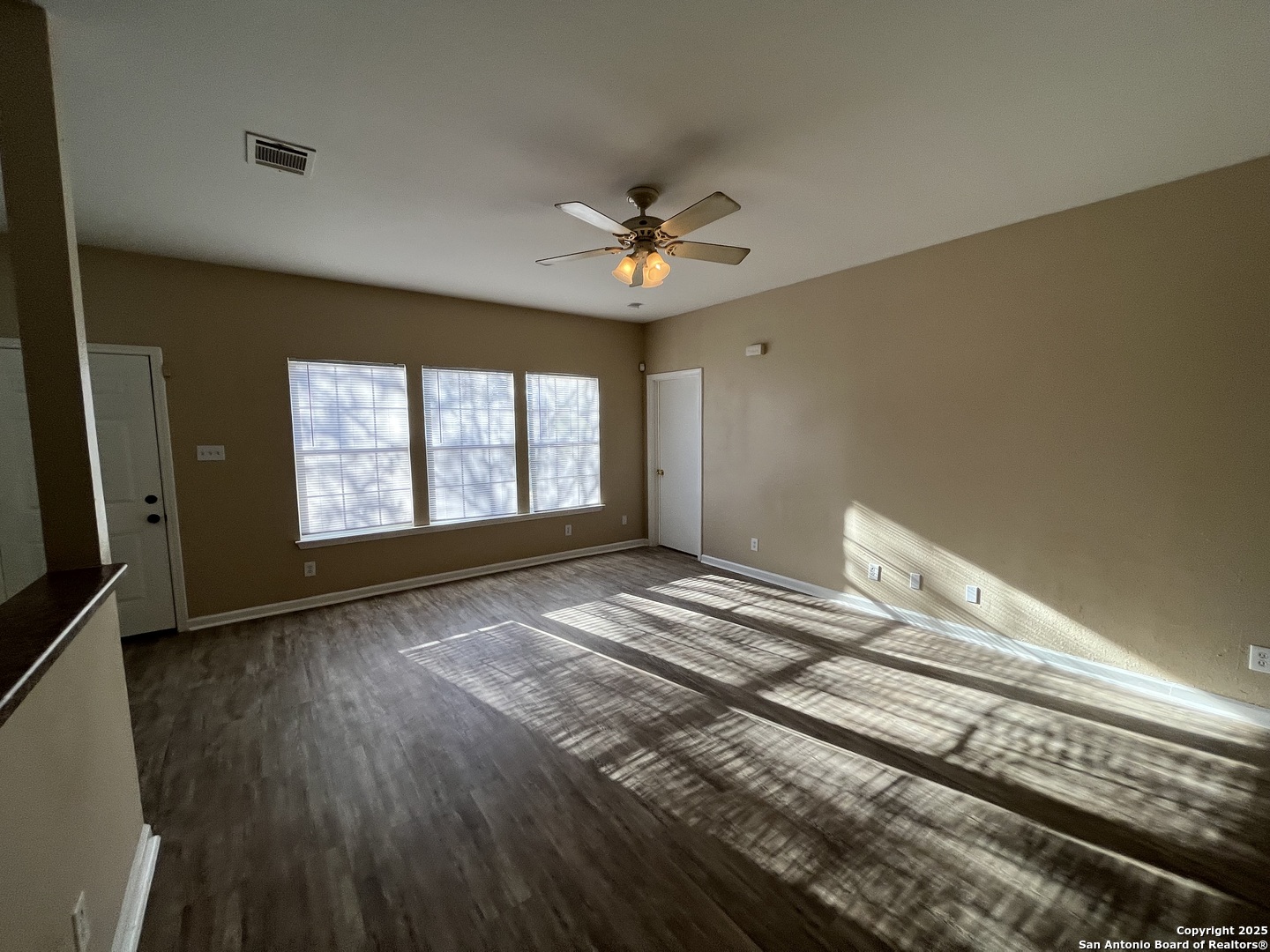 8806 Slumber Lane, Unit 101 Converse, TX 78109 - Photo 9 of 38 a view of an empty room with a window