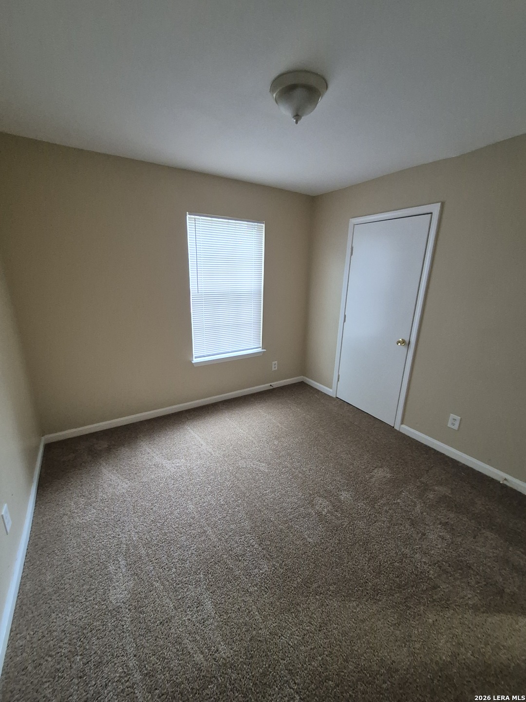 8806 Slumber Lane Converse, TX 78109 - Photo 10 of 39 an empty room with windows