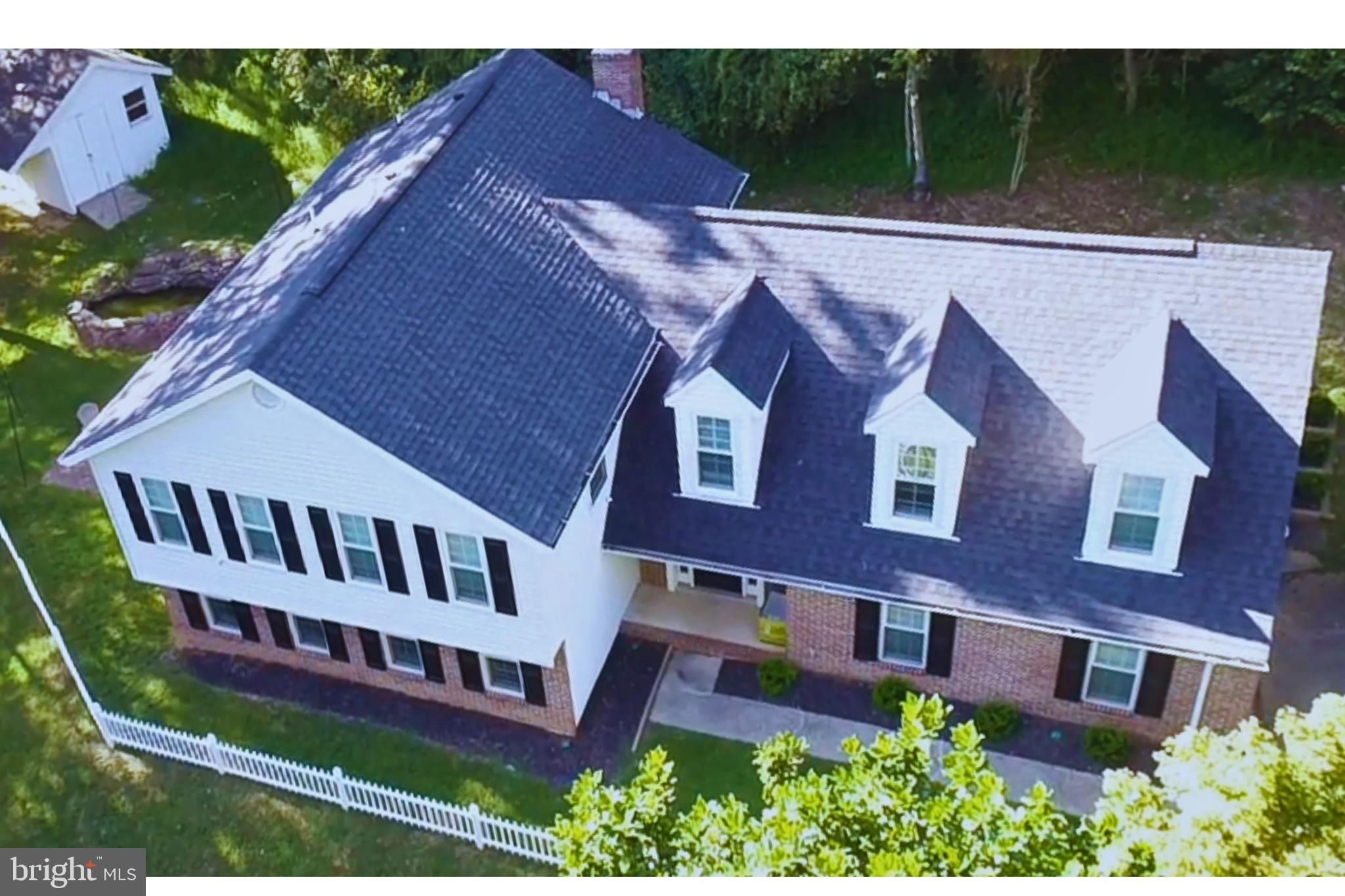 17930 Masemore Road Parkton, MD 21120 - Photo 41 of 46 a view of a building with a yard