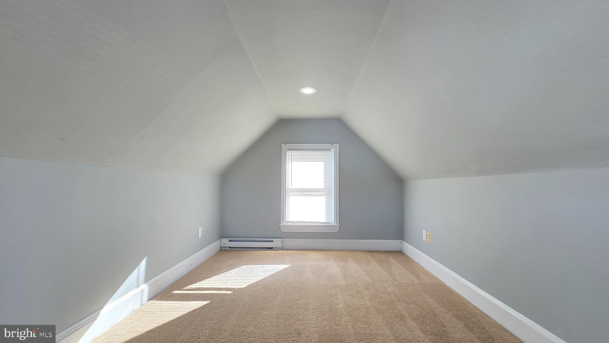 141 Bridgeboro Street, Unit 2 Riverside, NJ 08075 - Photo 5 of 7 an empty room with a window