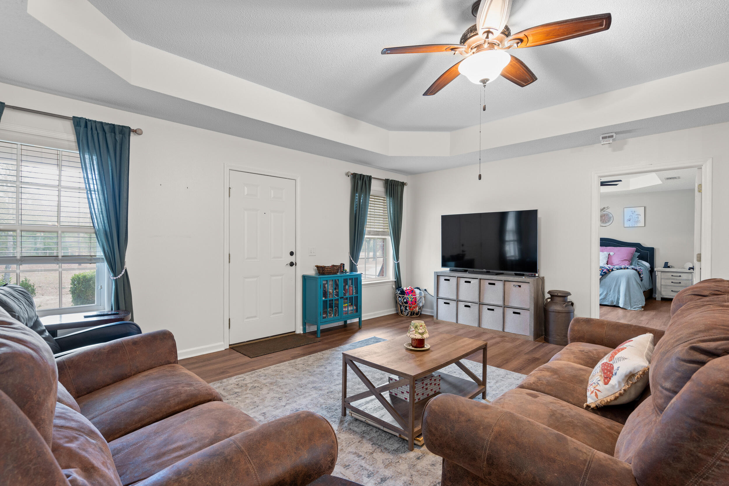5570 Mt Olive Road Crestview, FL 32539 - Photo 11 of 57 a living room with furniture and a flat screen tv